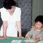 image for North Korea's current leader Kim Jong-un with his first teacher, 1990