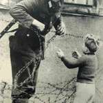 image for An East German soldier, against orders, let a boy cross the border to his family, 1961