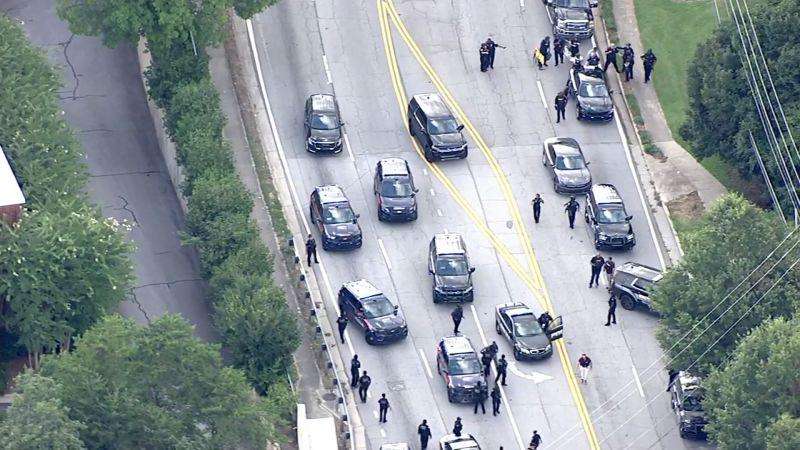 image for Live updates: Shooter appeared to target CDC headquarters in shooting that left police officer dead, sources say