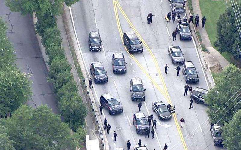 image for Live updates: Shooter appeared to target CDC headquarters in shooting that left police officer dead, sources say