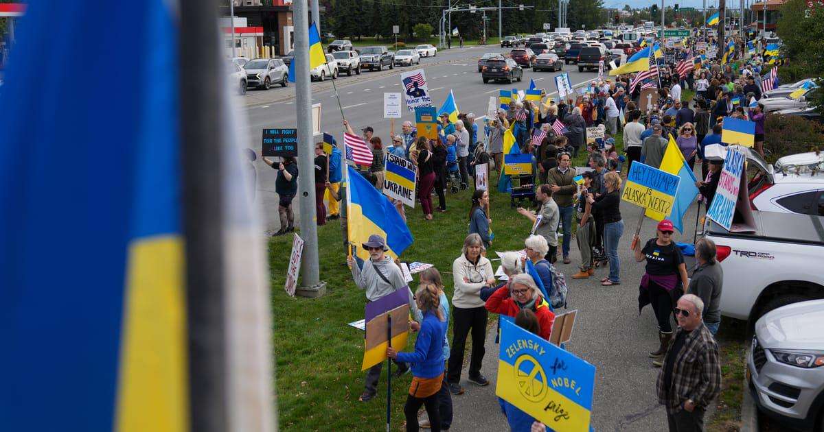 image for Alaskans greet Putin with Ukrainian flags, protest ‘war criminal hanging out here’