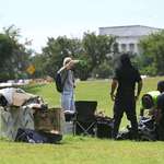 image for OC: Volunteers help people collec belongings as Washington, D.C. city workers dismantle tents.