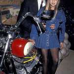 image for President Donald Trump and 11 year old daughter Ivanka pose at the Harley-Davidson Café opening