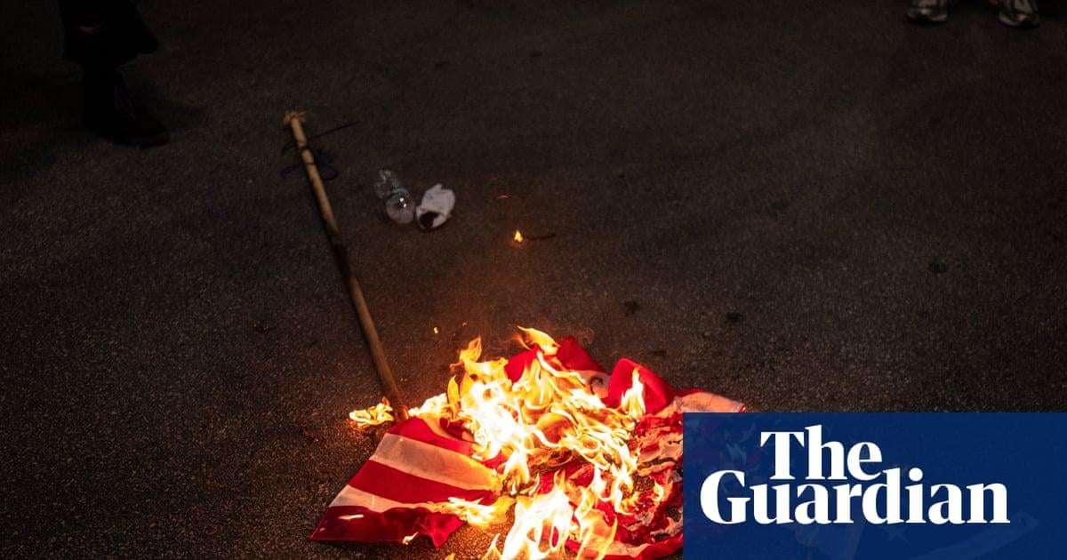image for Trump signs order to criminally charge those who burn US flag in protest