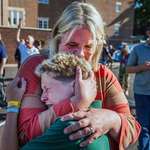 image for OC: A mom hugs her son outside a Minneapolis school and church. 2 children killed in a shooting.