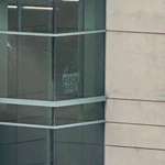 image for The windows on Building 18 at CDC headquarters, where an anti-vaxxer fired nearly 500 rounds