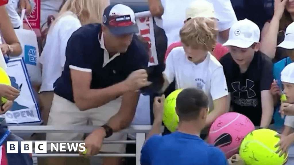 image for CEO Piotr Szczerek who snatched boy's hat at US Open says he made 'huge mistake'