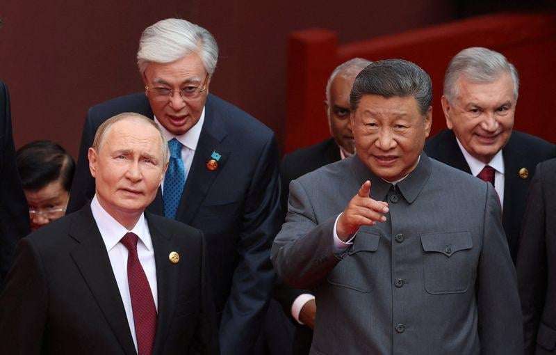 image for Hot mic picks up Putin and Xi discussing organ transplants and immortality