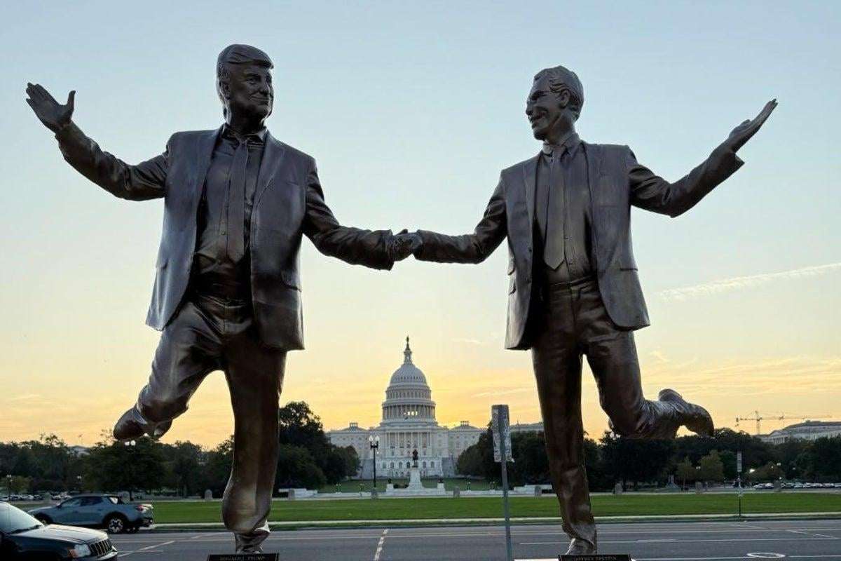 image for Mysterious new statue of Epstein and Trump holding hands appears on the National Mall