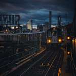 image for 7 train arriving during sunset | NYC