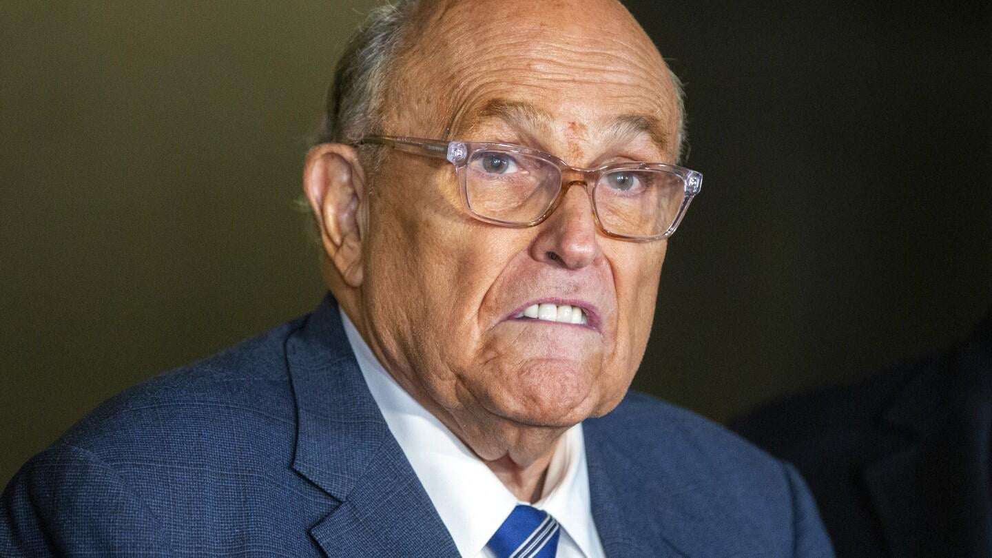 image for Rudy Giuliani and Dominion Voting Systems settle defamation suit over his 2020 election claims
