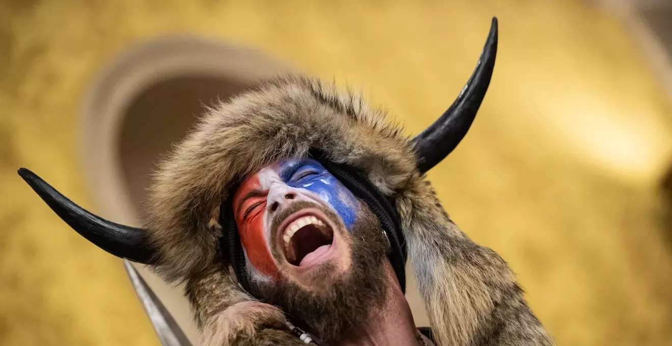 image for QAnon Shaman says he’s rightful president, sues Trump for $40 trillion