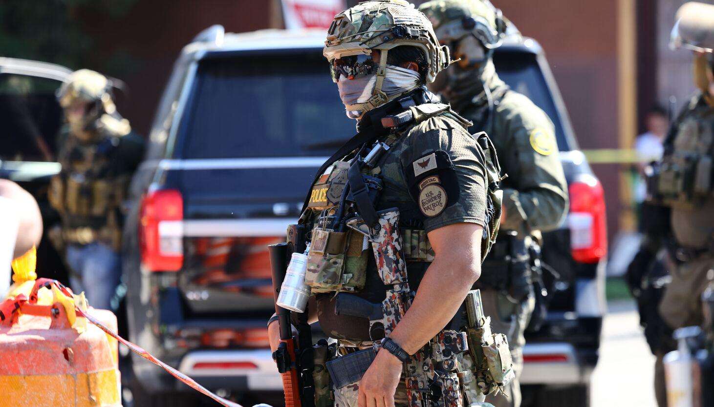 image for Federal agents shoot woman on Southwest Side, battle protesters for hours