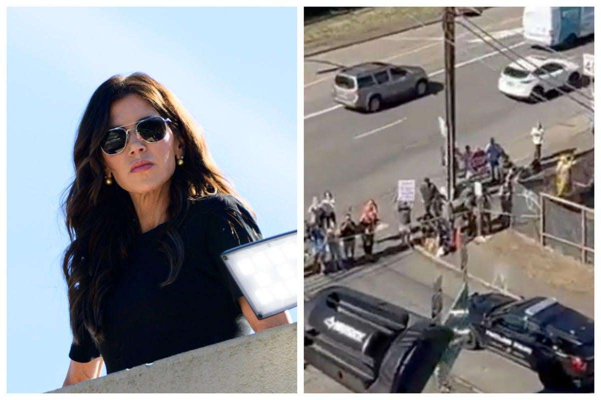 image for Kristi Noem praised for ‘staring down’ Antifa. It was a dozen reporters and a guy in a chicken suit