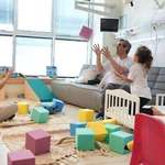 image for Omri Miran plays with his two young daughters after release from 2-year Hamas captivity