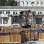image for Excavator currently tearing down the east wing of the White House.