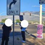 image for There was a one-person protest (and one-person anti-protest) at a busy intersection in my hometown.