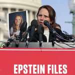 image for Epstein Victim Jena-Lisa Jones holds up photo of herself at Capitol today (Heather Diehl)