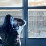 image for A glitch with a file conversion ended up looking cool; my wife at the Louvre [OC]