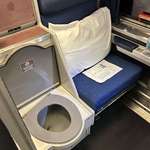 image for Behold the Amtrak "Roomette". Two facing travel seats and one for quality time. Cozy.