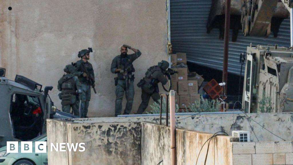 image for West Bank: Israeli troops kill two Palestinians after they appear to surrender