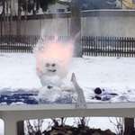 image for [OC] When we were kids we stuck a firecracker in a small snowman and took a perfectly timed picture
