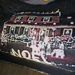 image for A photo blanket Costco sent us 7 years ago of someone else's house.