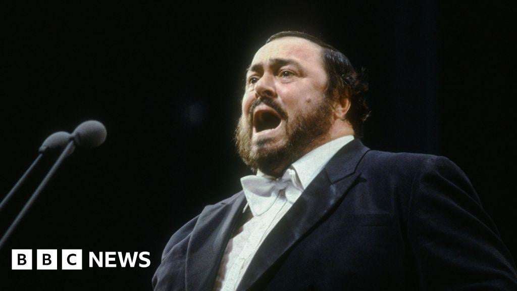 image for Pavarotti statue frozen knee-deep in ice rink strikes wrong note in Italy