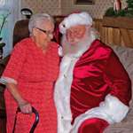 image for My mother finally got to sit on Santa's lap when she was 91 years old.
