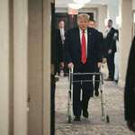 image for Trump using a walker after he signed an executive order banning states from regulating AI