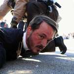 image for Minister Michael Woolf detained by Illinois State Police during protest outside Chicago ICE facility