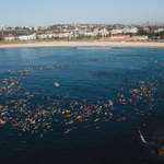 image for Hundreds of surfers paddle-out at Bondi to commemorate victims of the attack