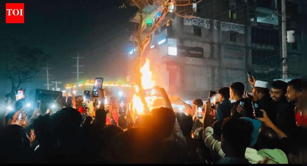 image for Bangladesh unrest: Hindu man lynched, body tied to tree and set on fire as tensions escalate