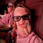 image for Watching Avatar and I looked over to see this horror. My daughter snuck in a Hello Kitty face mask.