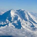 image for Mount Rainier on the flight out this morning. Credit: My wife, edited by me.