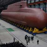 image for North Korea’s leader, Kim Jong-un, visits the construction site of a nuclear-powered submarine.