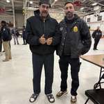 image for Former Venezuelan President Nicolás Maduro giving the thumbs up alongside a DEA Agent