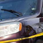 image for Bullet holes where ice officers shot and killed a us citizen
