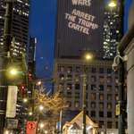 image for 'Arrest Trump Cartel' projected on third ave