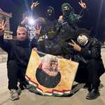 image for Protesters flip the Ayatollah’s portrait, a rare act of public defiance in Iran