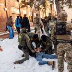 image for Border Patrol agents detain a person near Roosevelt high school during a protest in Minnesota.