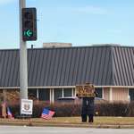 image for One woman protest in a predominantly Republican area. Never stop fighting.