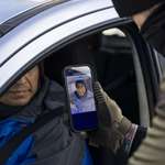 image for OC: Border Patrol Agent scans the face of a driver as they stop and question him in Minneapolis.