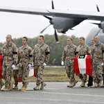 image for The coffins of Danish soldiers who died in Afghanistan in 2007, supporting America's Article 5 call