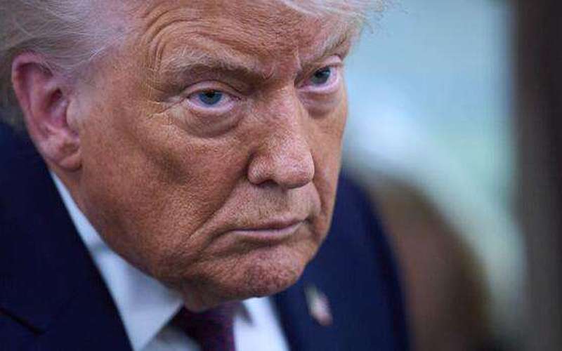 image for Trump threatens 100% tariffs on all Canadian goods if Canada 'makes a deal with China'