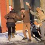 image for No gun in hand, just standing up for the woman who was just shoved on the ground by ICE.