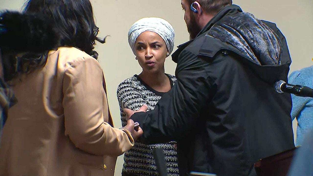 image for Ilhan Omar sprayed by unknown substance after man charges her at Minneapolis town hall