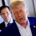 image for Macro Rubio, behind Trump.