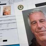 image for A picture of some printed out papers that may have been redacted to protect someone