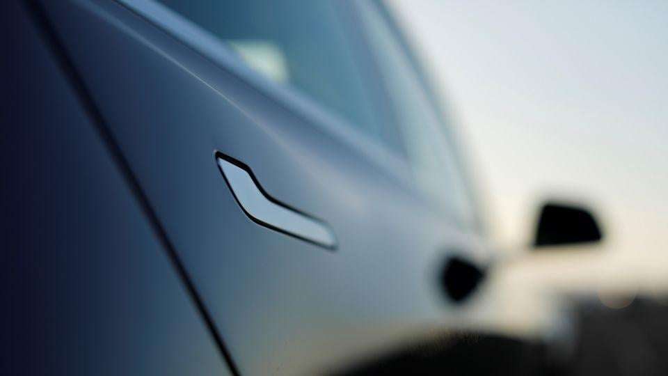 image for China to ban hidden car door handles made popular by Tesla in world first
